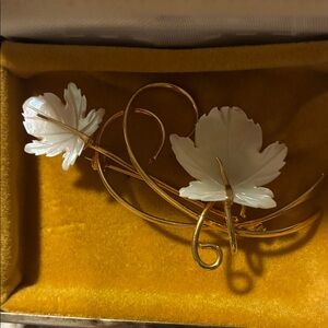 Elegant Gold and White Floral Brooch